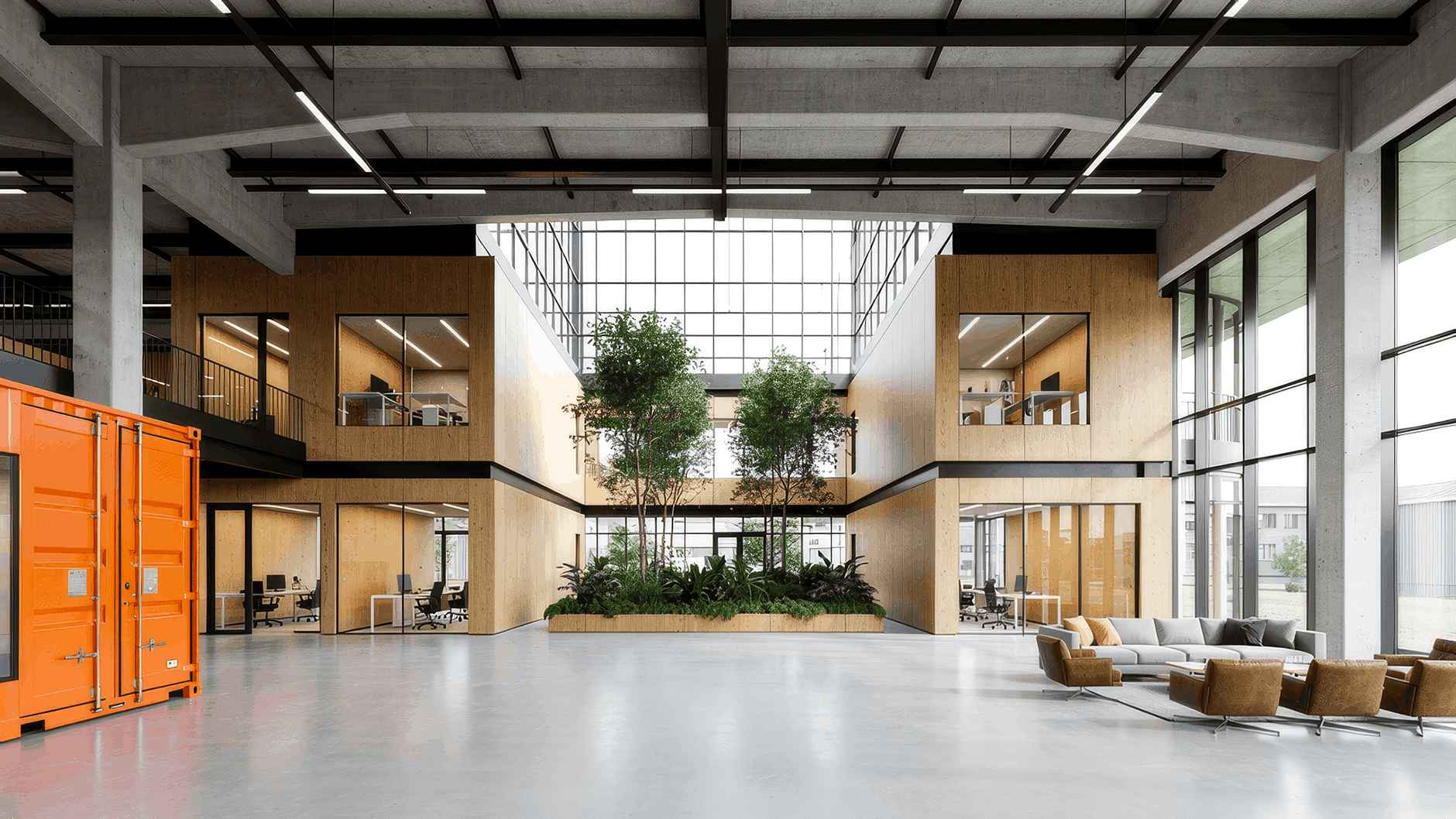 Un vaste lobby central pensé comme une place de village professionnelle, où se croisent travail, échanges informels et opportunités de collaboration.